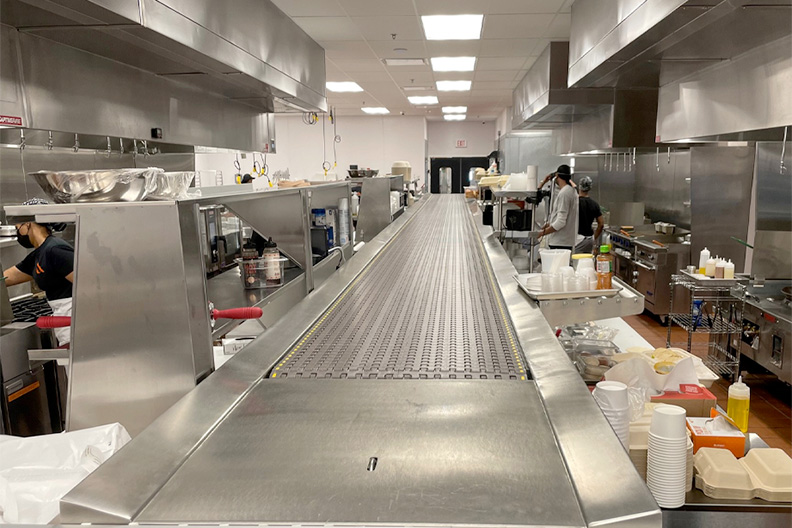 Conveyer belt in the kitchen at our food hall near Barclay-Kingston, Cherry Hill, NJ.