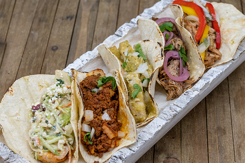 Five soft-shell tacos prepared at our Barclay-Kingston, Cherry Hill food place.