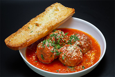 Four meatballs and bread served at our restaurants near Barrington NJ.