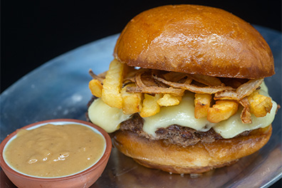 Craft burger prepared for food delivery near Ashland, Cherry Hill, New Jersey.